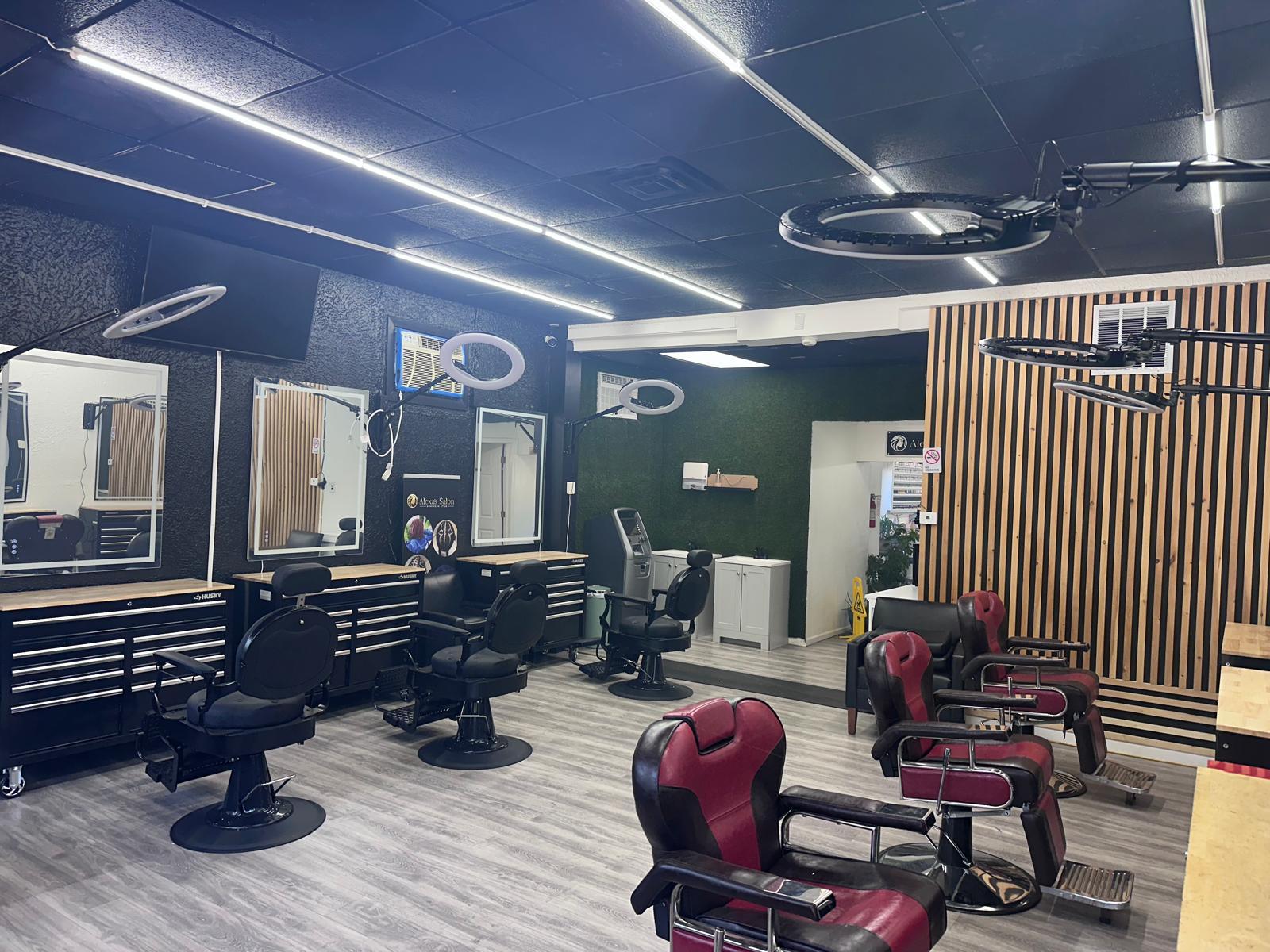 Barber chairs and wood wall at Alexa's Salon Barber Shop